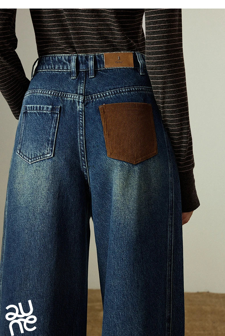 Wide-leg split denim pants – structured, color-contrast, winter style.